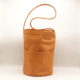sac seau en cuir, le Ninja so acidulé, doublure en tissu vert, vue de face